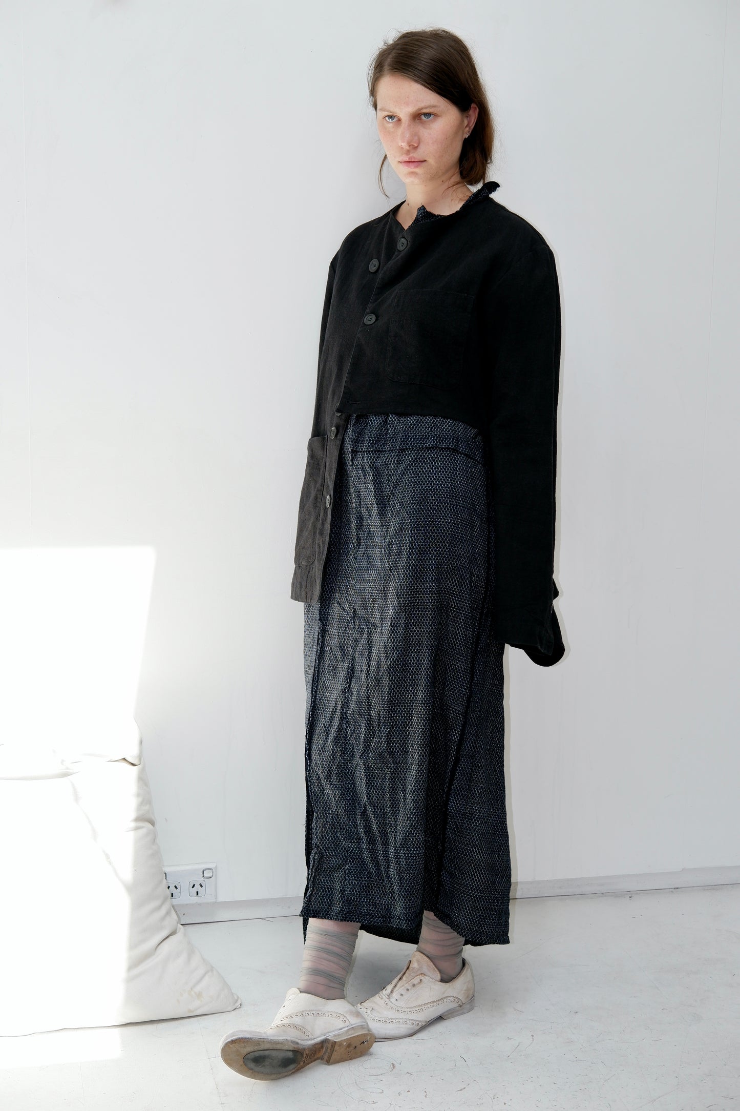 Black buttoned jacket with half cut