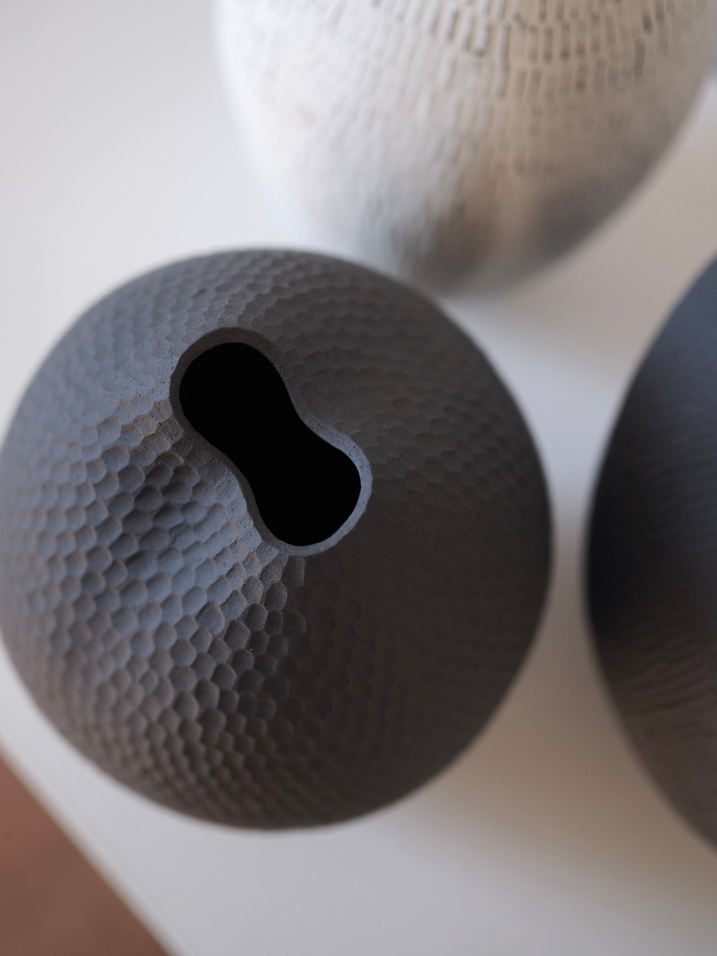 Black Carved Pod Vase / White Carved Pod Vase with Silver Staple