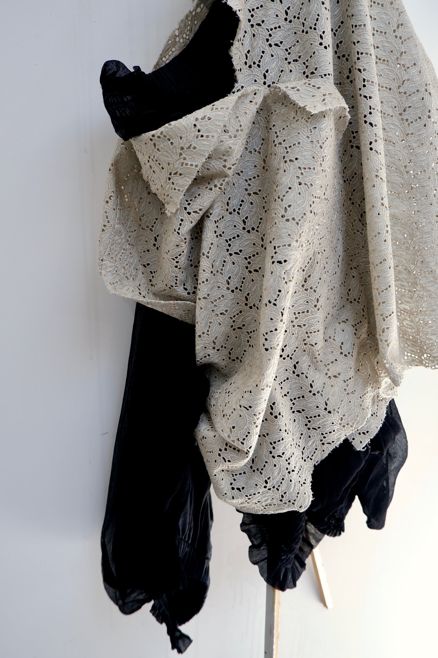 Black ‘2 sides’ long-sleeves top. W. Hand stitching