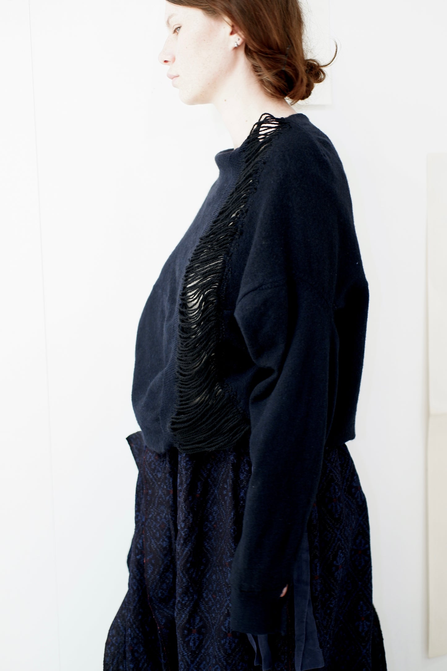 Navy jumper with open hand stitched front