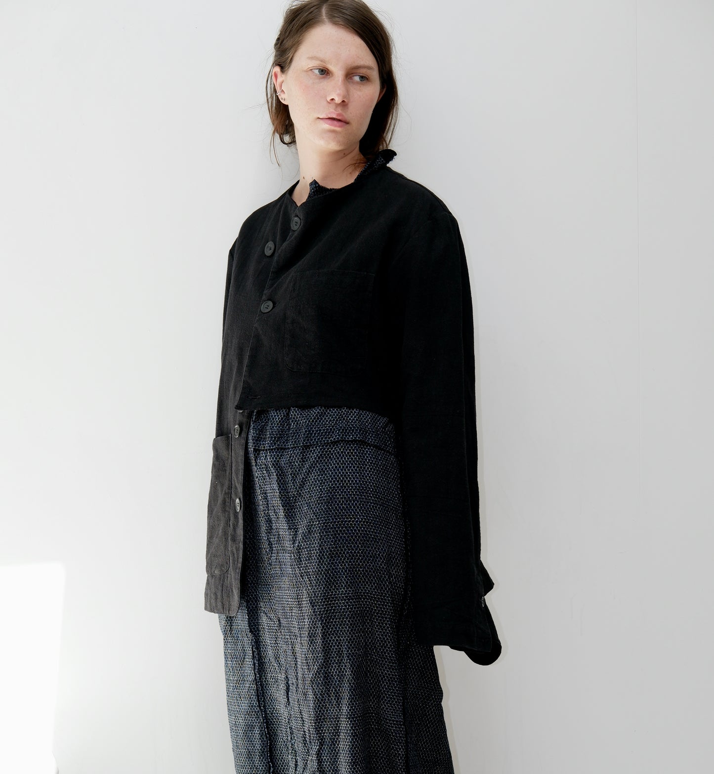 Black buttoned jacket with half cut