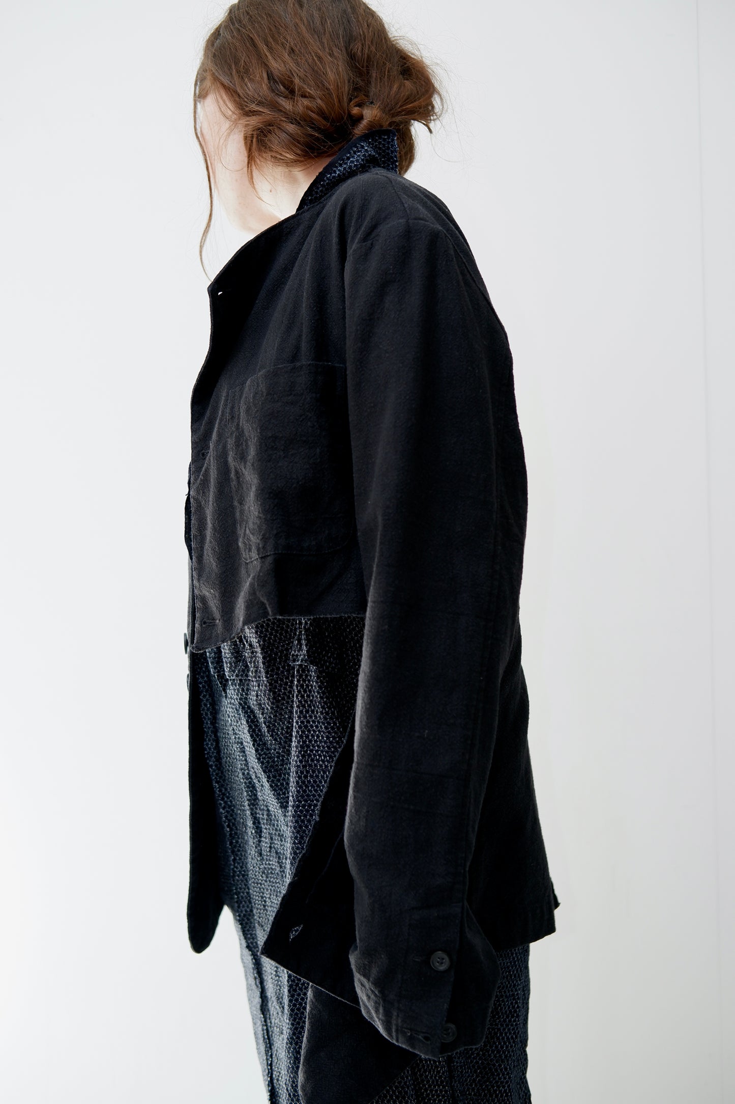 Black buttoned jacket with half cut