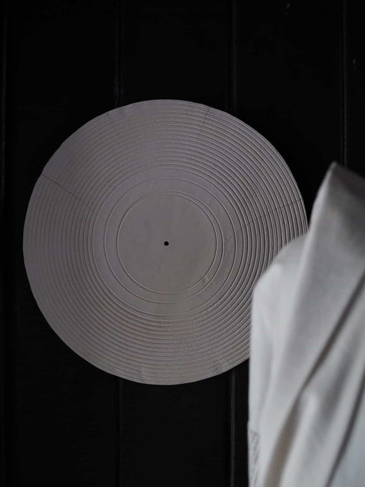 UNGLAZED PORCELAIN RECORD