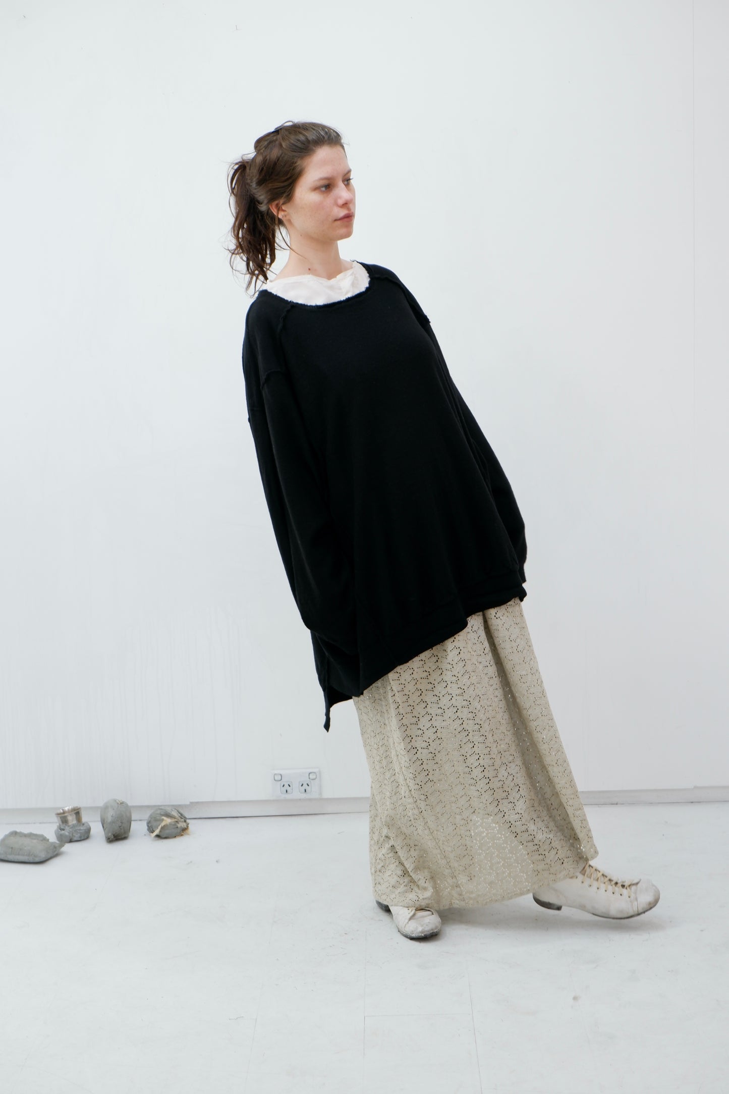 Black Merino '2 sides' jumper with hand-stitched neck