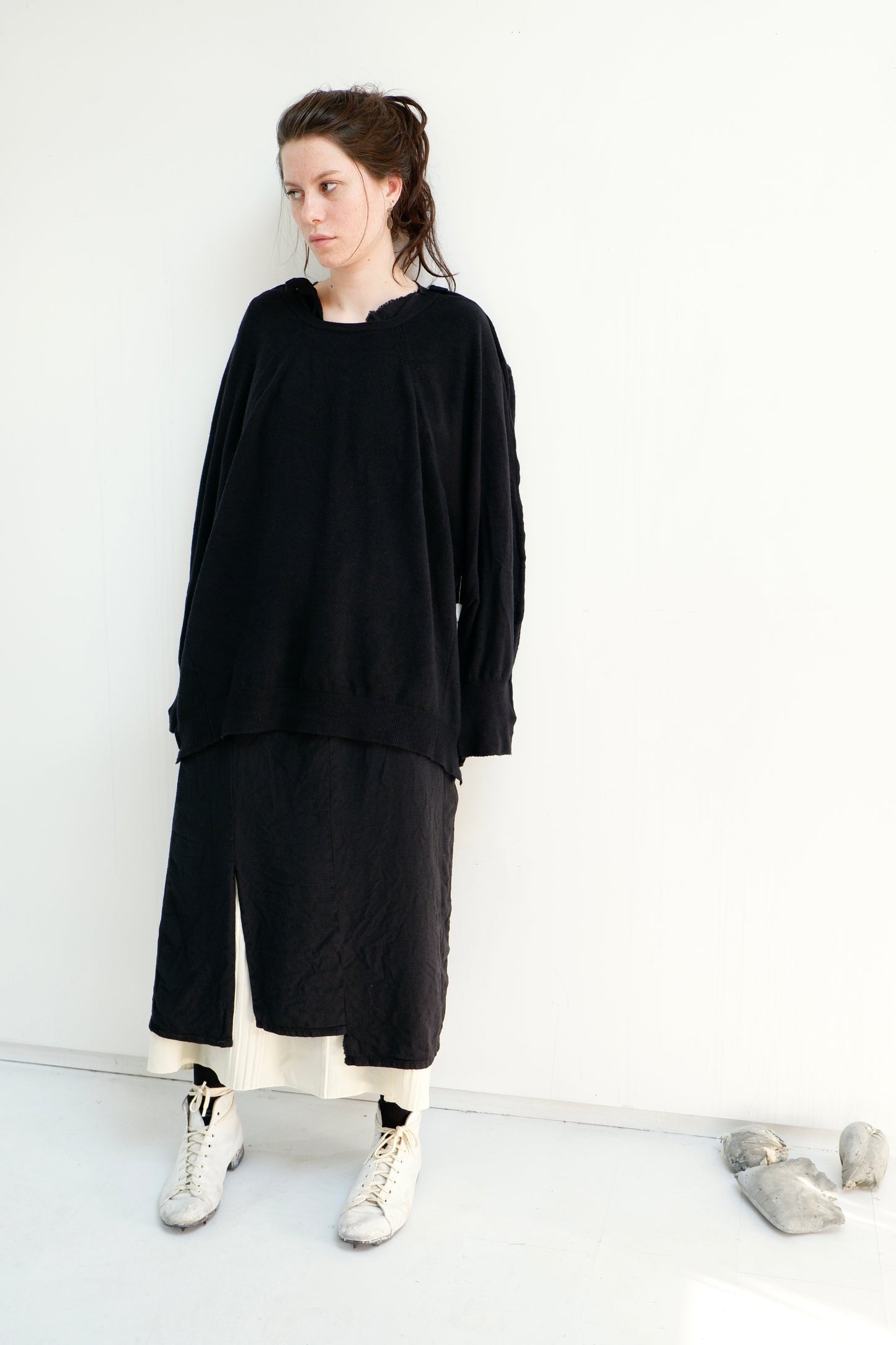 Black Merino '2 sides' jumper with hand-stitched neck