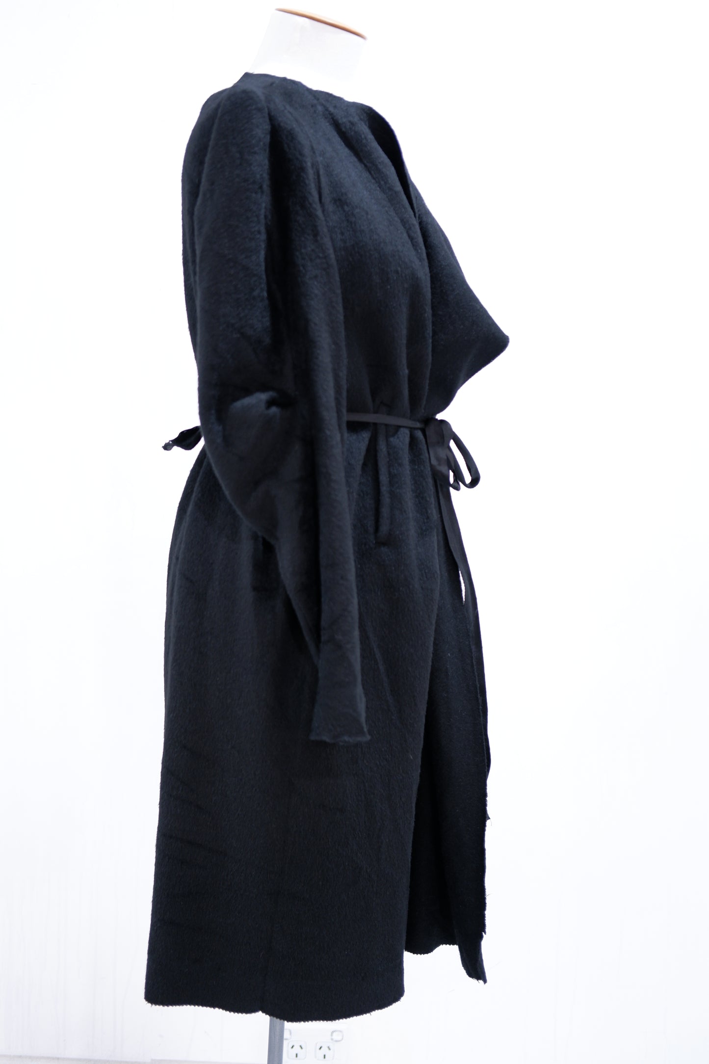 Black wool coat with silk lapel and waist tie front