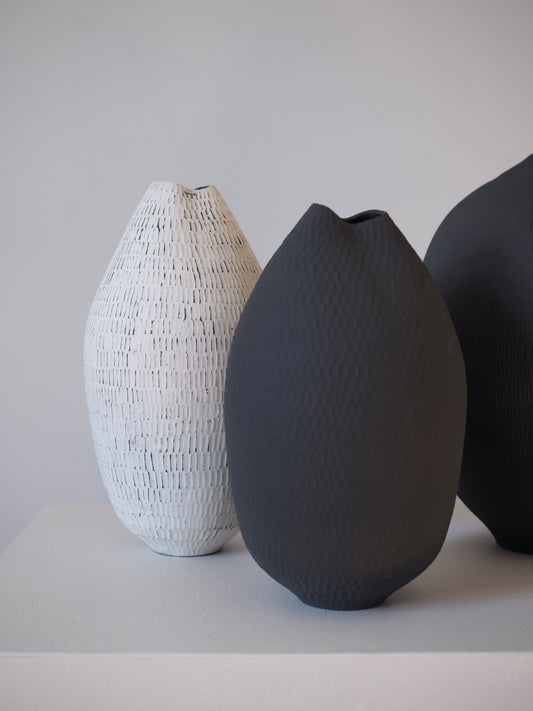 Black Carved Pod Vase / White Carved Pod Vase with Silver Staple