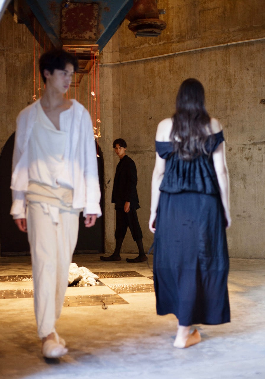 Black deconstructed jacket with sculptural shoulder / Black skirt w pockets