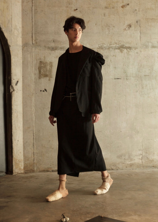 Black deconstructed jacket with sculptural shoulder / Black skirt w pockets