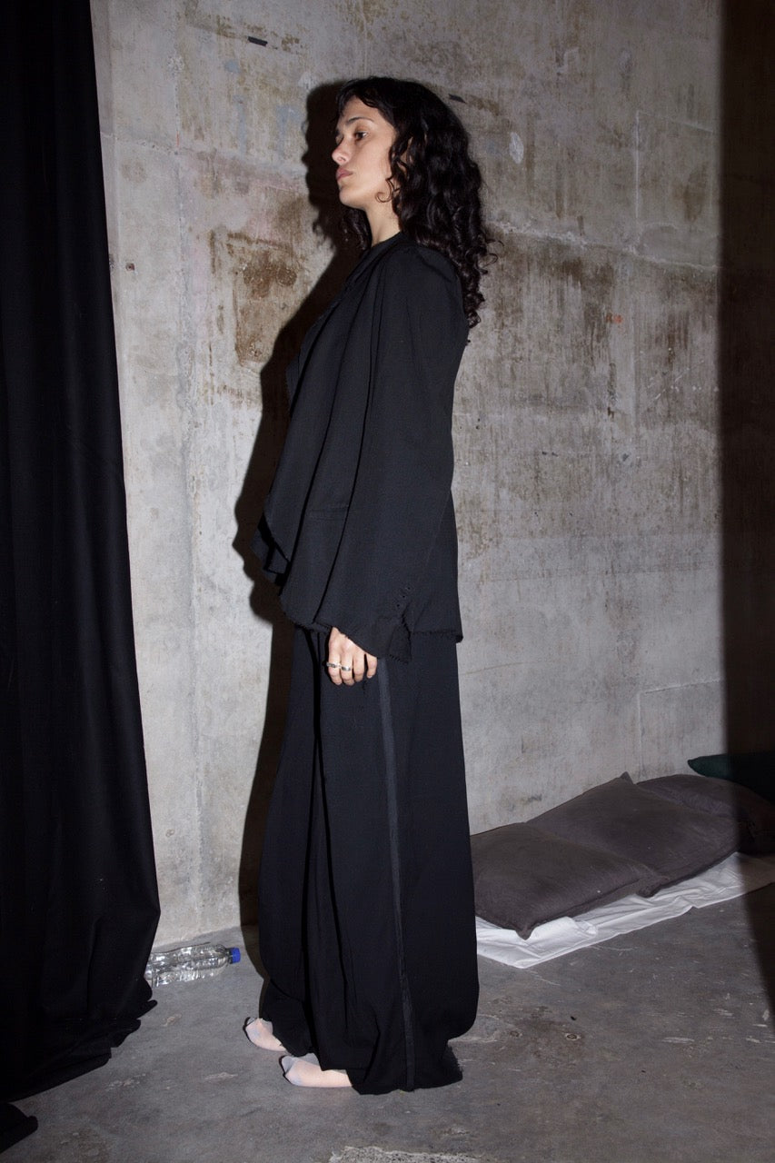 Deconstructed jacket with raw edges (no lining )