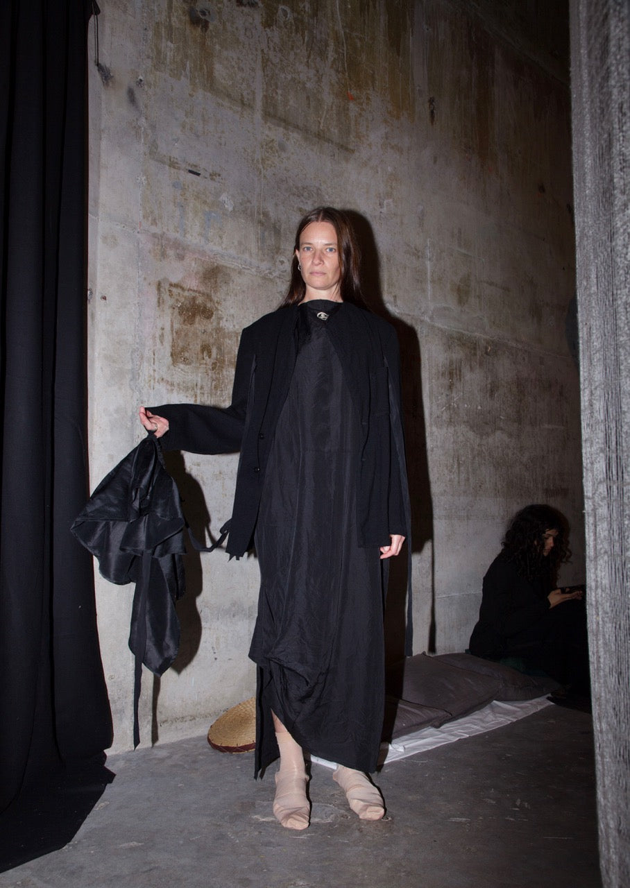 Darkest blue deconstructed jacket with hand-stitched lapel and dropped shoulder with waist tie