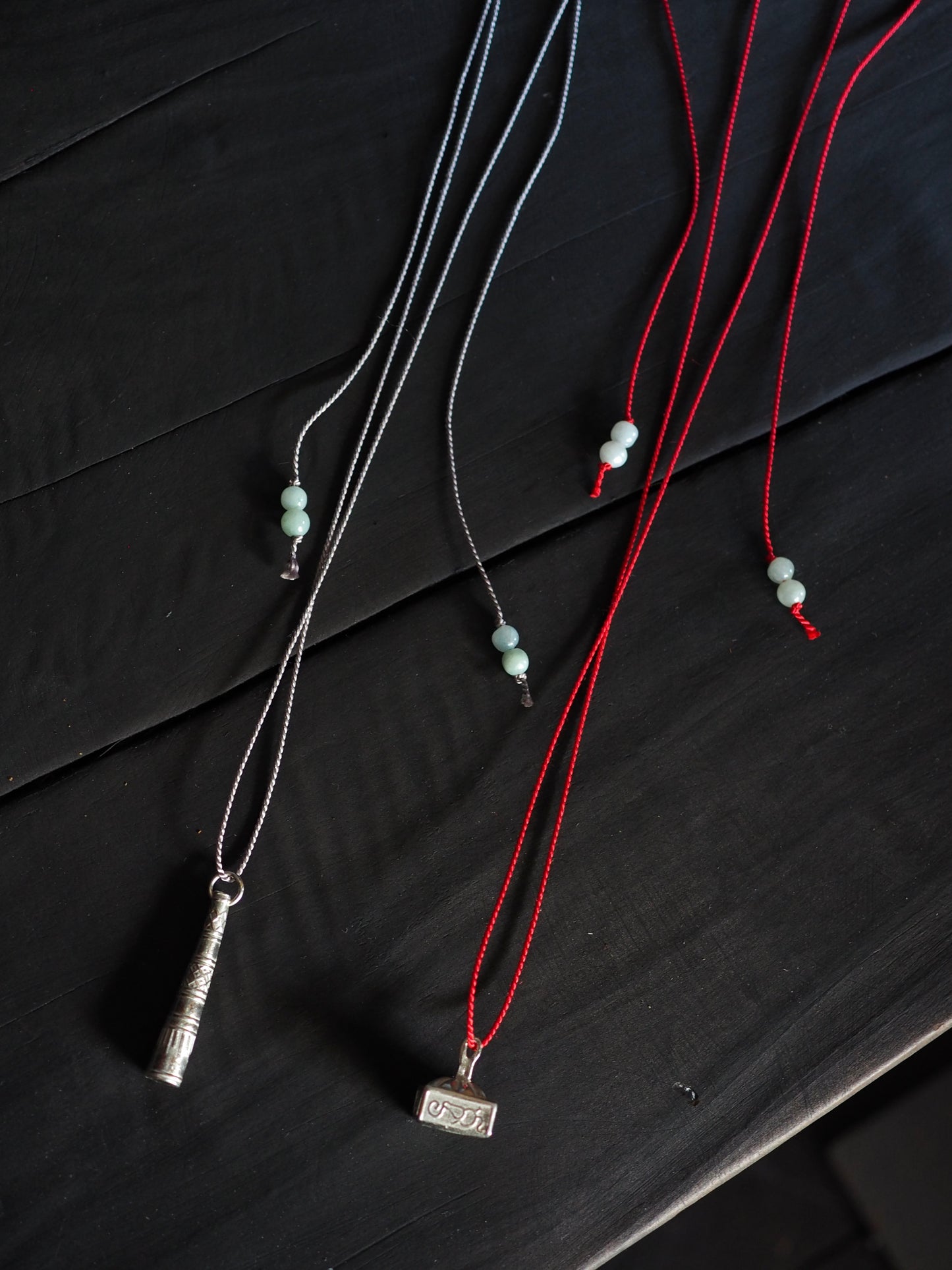 Silver Box Stamp on Red Silk Necklace / Silver Kareidoscope on Grey Silk Necklace