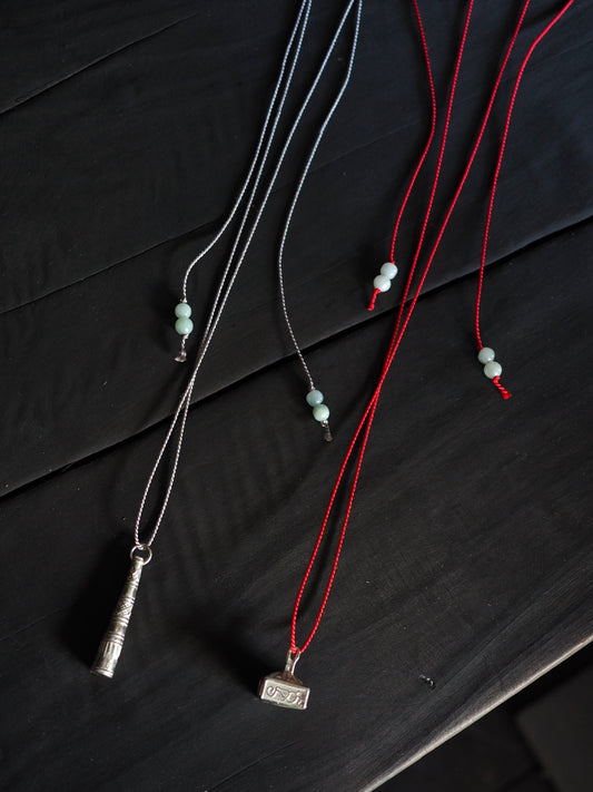 Silver Box Stamp on Red Silk Necklace / Silver Kareidoscope on Grey Silk Necklace