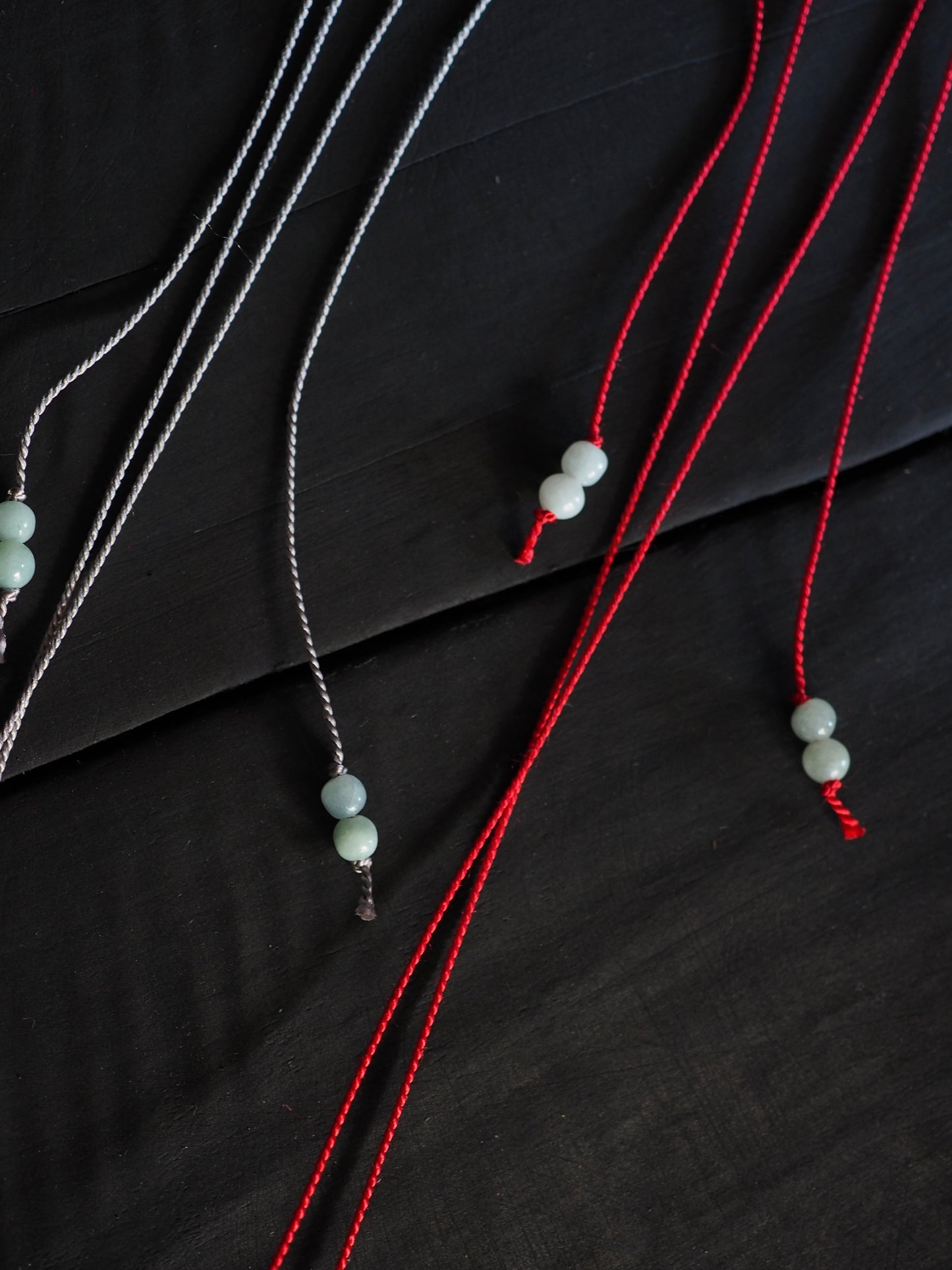 Silver Box Stamp on Red Silk Necklace / Silver Kareidoscope on Grey Silk Necklace