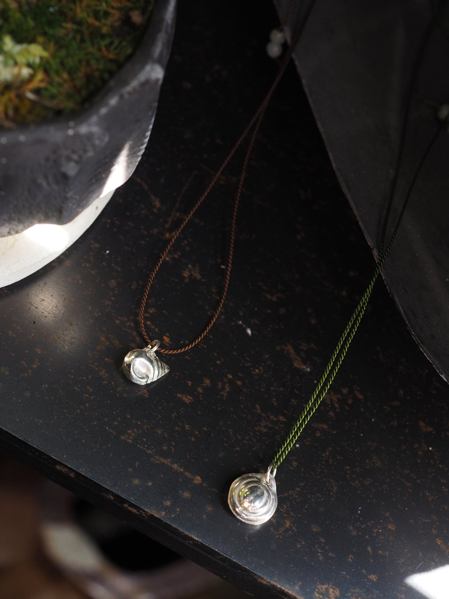 Silver Moon Shell on Green Silk Necklace