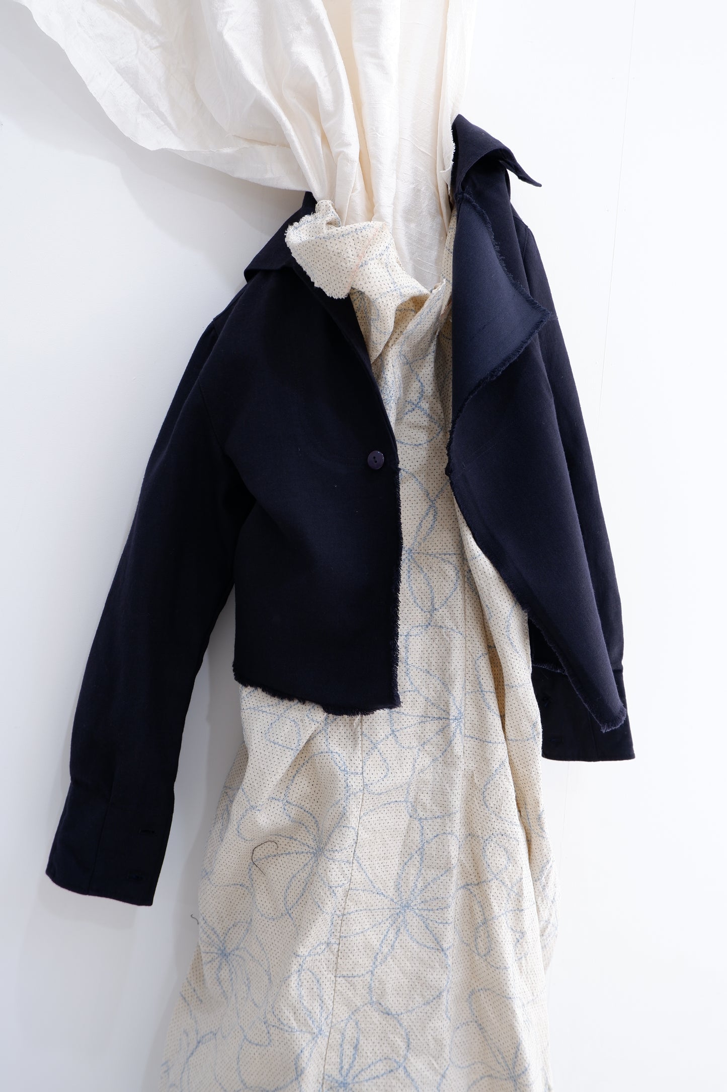 Asymmetrical creamy kimono shift dress or Navy cropped sailor’s jacket w. raw edges